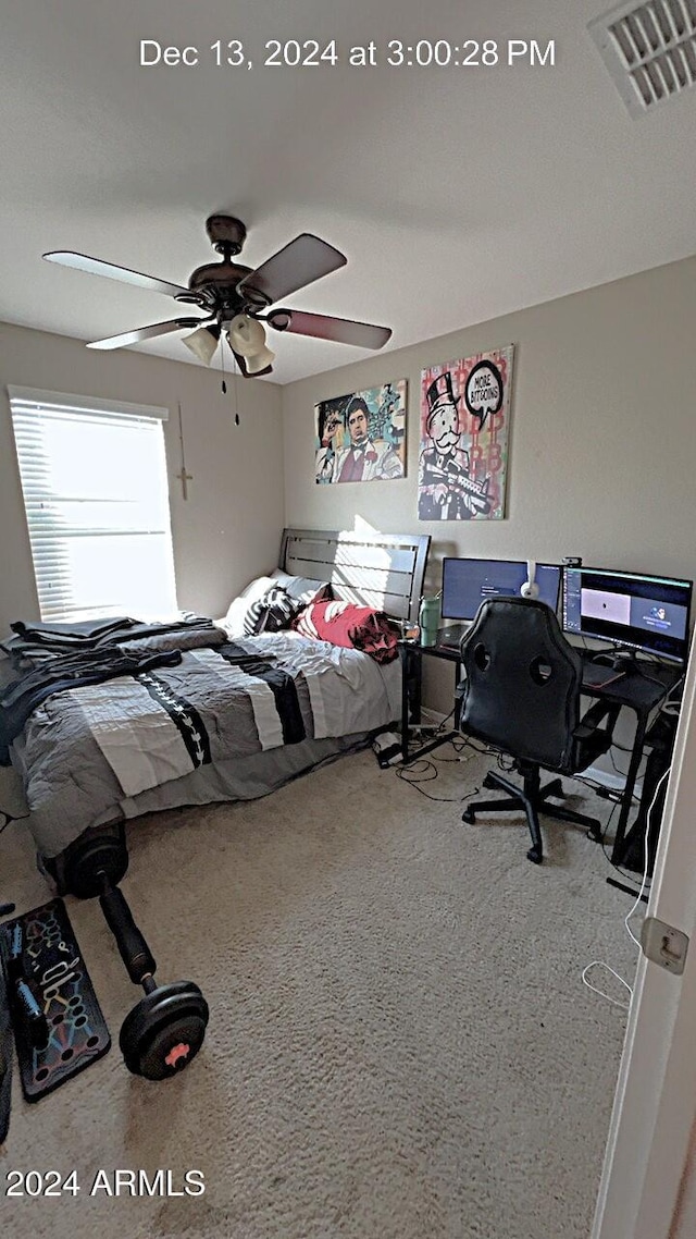 unfurnished bedroom with carpet flooring and ceiling fan