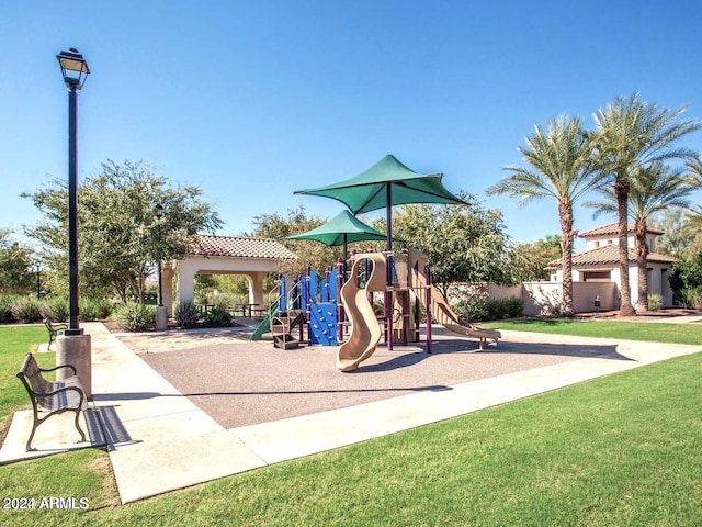 view of playground featuring a lawn