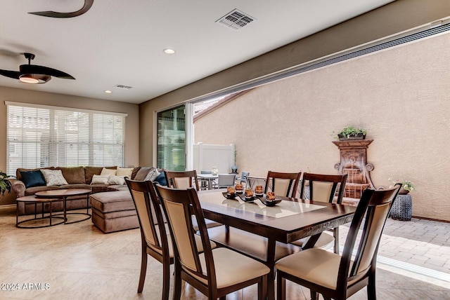 dining area with ceiling fan