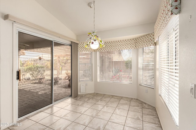 22319 N Desperado Dr, Sun City West, AZ 85375 - unfurnished dining area with a wealth of natural light, tile patterned floors, and lofted ceiling