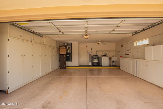 22319 N Desperado Dr, Sun City West, AZ 85375 - garage with a sink, washer and clothes dryer, and a garage door opener