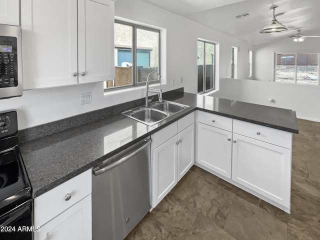 kitchen featuring black stove, white cabinetry, dishwasher, decorative light fixtures, and sink