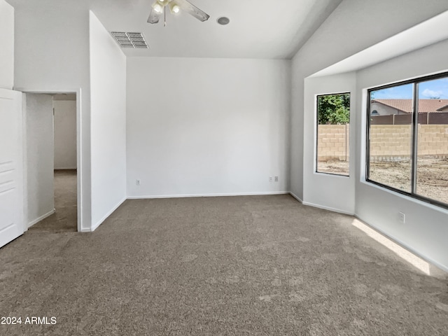 carpeted empty room with ceiling fan