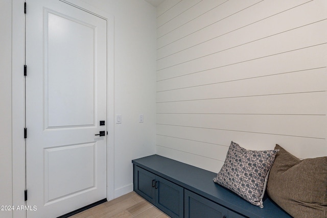 mudroom with light hardwood / wood-style floors