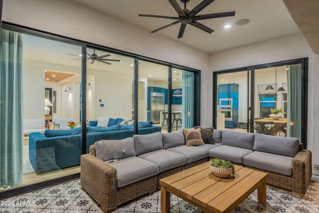 living room with ceiling fan