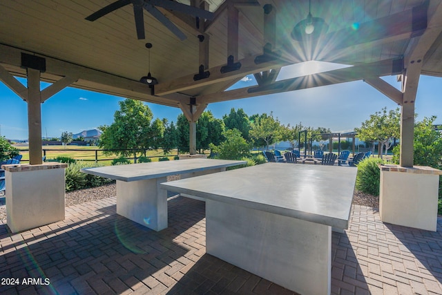 view of patio / terrace featuring ceiling fan