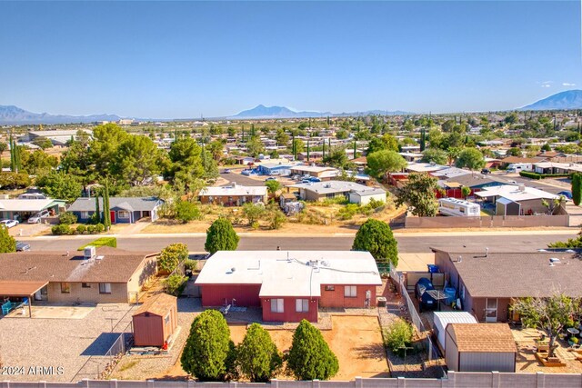 drone / aerial view featuring a mountain view