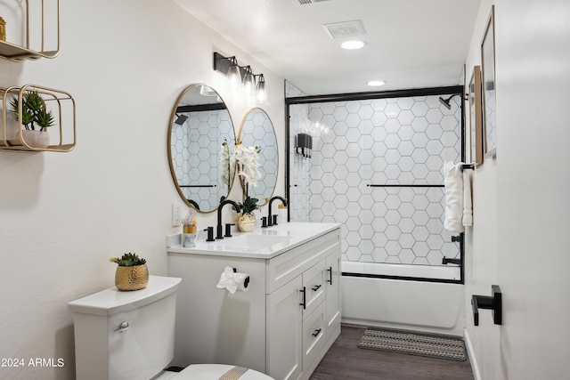 3814 N 36th St, Phoenix, AZ 85018 - bathroom with vanity, enclosed tub / shower combo, wood finished floors, and recessed lighting