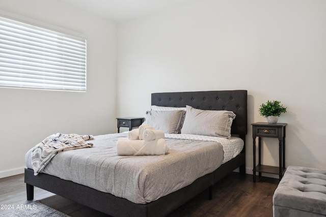 3814 N 36th St, Phoenix, AZ 85018 - bedroom with dark wood-style floors and baseboards