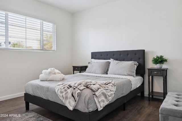 3814 N 36th St, Phoenix, AZ 85018 - bedroom featuring dark wood-type flooring and baseboards