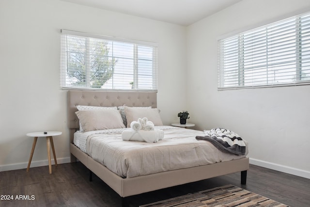 3814 N 36th St, Phoenix, AZ 85018 - bedroom featuring wood finished floors and baseboards