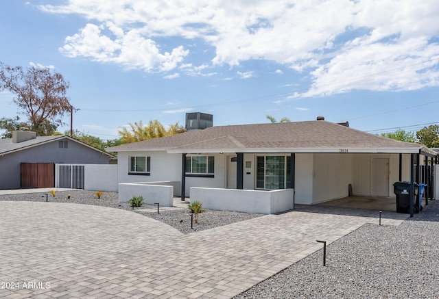 3814 N 36th St, Phoenix, AZ 85018 - single story home featuring driveway, a porch, an attached carport, and a shingled roof