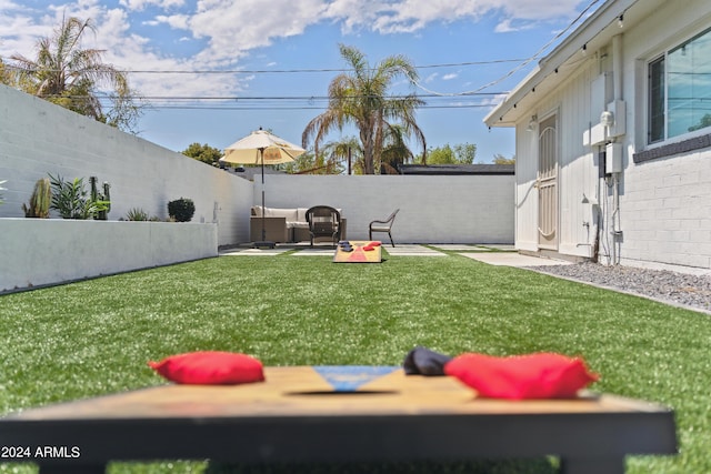 3814 N 36th St, Phoenix, AZ 85018 - fenced backyard featuring a patio area and outdoor lounge area