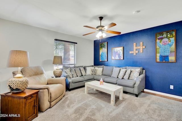 living room featuring light colored carpet and ceiling fan