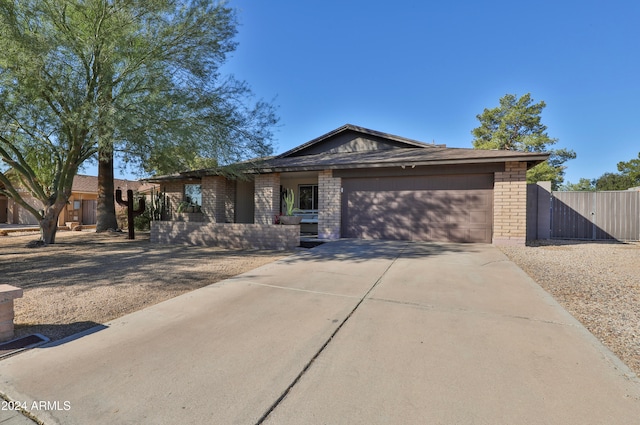 single story home with a garage