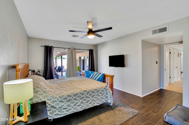 bedroom featuring ceiling fan and dark hardwood / wood-style flooring