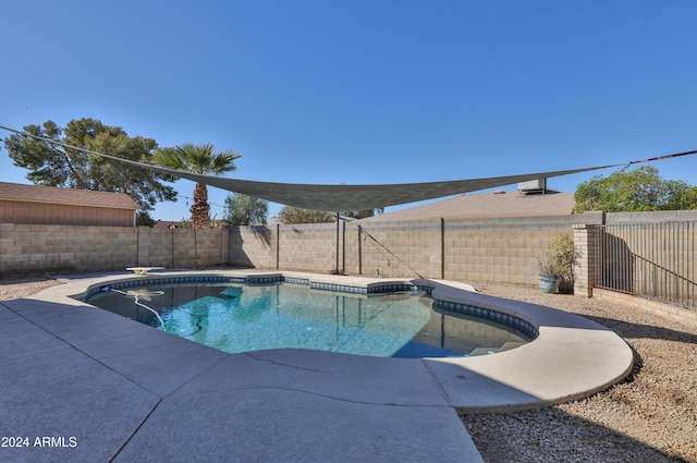 view of pool featuring a patio and a diving board