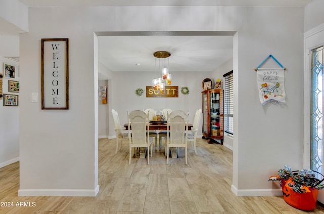 dining area featuring a chandelier