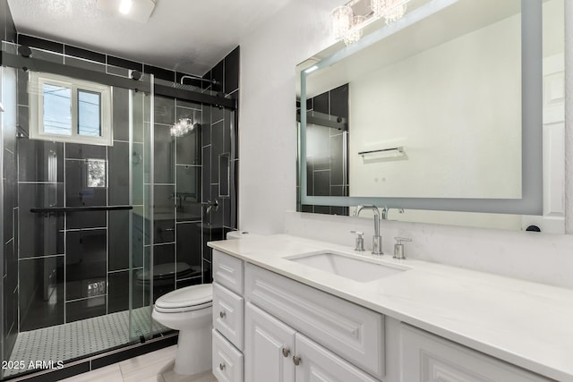 full bath featuring vanity, toilet, and a stall shower