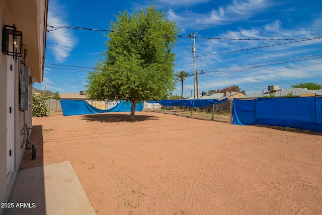 view of property's community with a fenced backyard