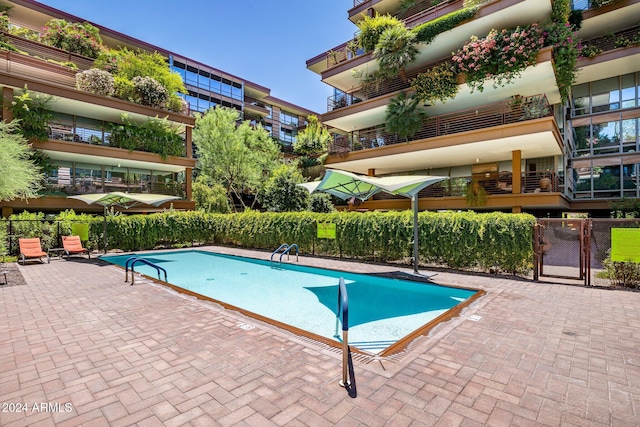 view of pool with a patio area