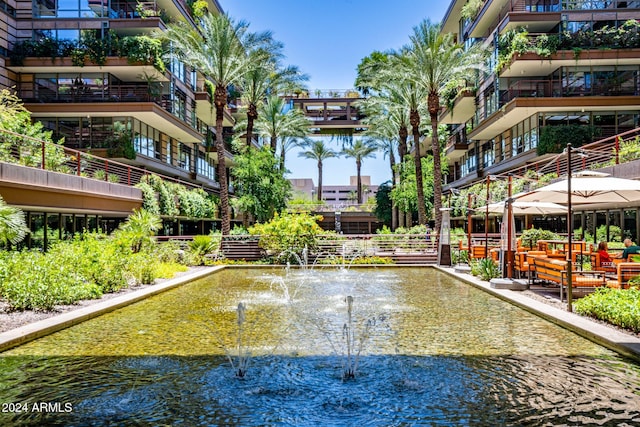 view of home's community with a water view