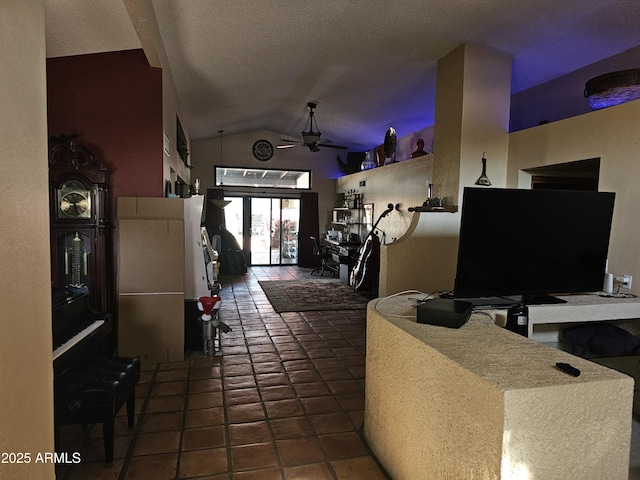 15240 N 51st St, Scottsdale, AZ 85254 - living area featuring a textured ceiling, ceiling fan, tile patterned flooring, and vaulted ceiling