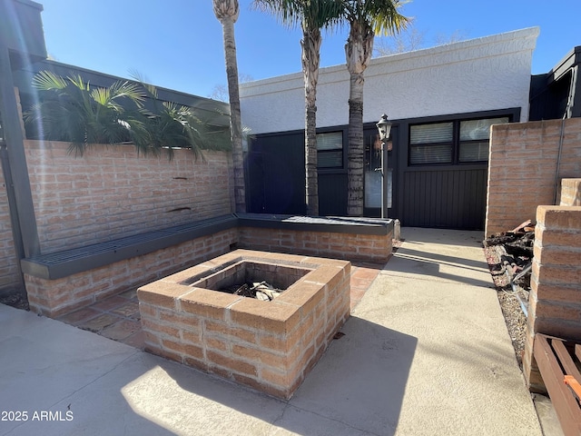 15240 N 51st St, Scottsdale, AZ 85254 - view of patio / terrace with fence and an outdoor fire pit