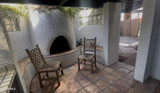 15240 N 51st St, Scottsdale, AZ 85254 - view of patio / terrace featuring fence and a fireplace