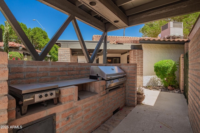 15240 N 51st St, Scottsdale, AZ 85254 - view of patio with an outdoor kitchen and a grill