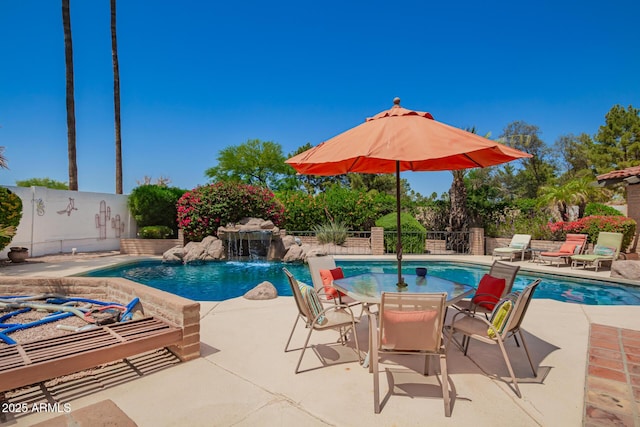15240 N 51st St, Scottsdale, AZ 85254 - view of pool with fence, a fenced in pool, outdoor dining area, and a patio area
