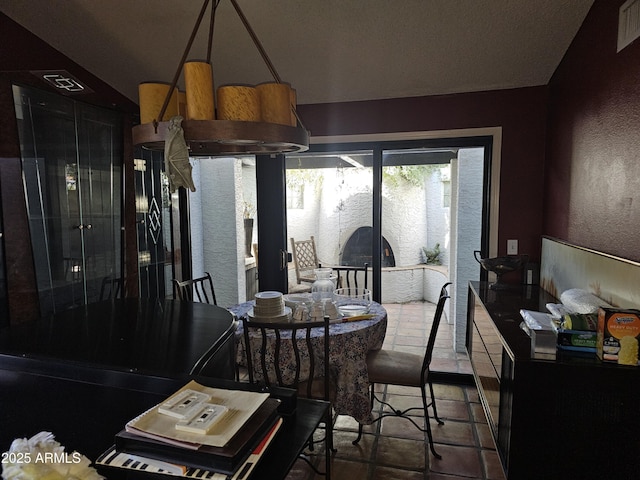 15240 N 51st St, Scottsdale, AZ 85254 - dining room with visible vents and a textured wall