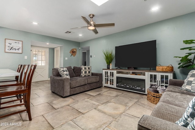 living room with ceiling fan