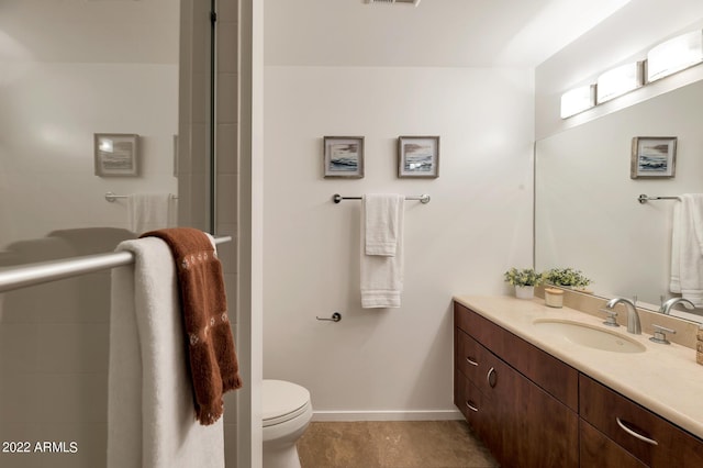 bathroom featuring visible vents, an enclosed shower, tile patterned flooring, vanity, and toilet