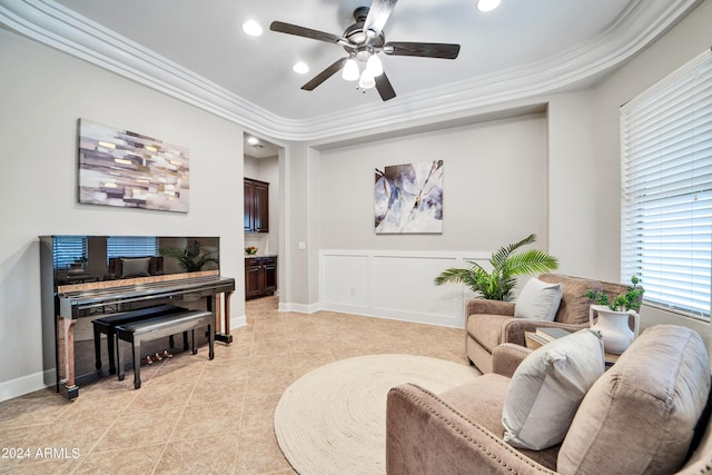 living area featuring light tile patterned floors, baseboards, ceiling fan, crown molding, and recessed lighting