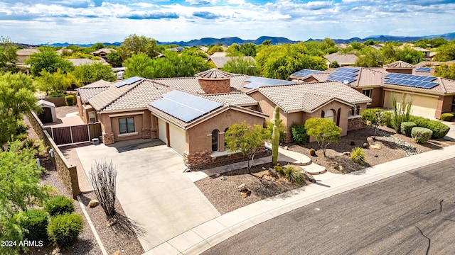 bird's eye view featuring a residential view and a mountain view