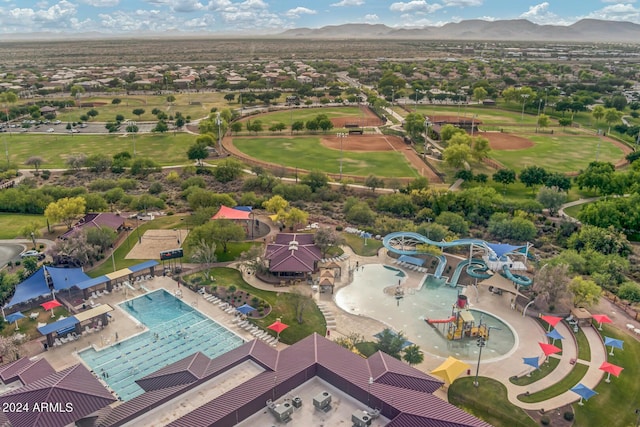 bird's eye view featuring a mountain view and golf course view