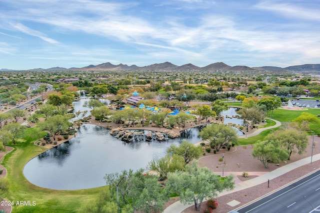 drone / aerial view with a water and mountain view