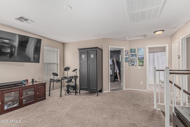 workout area with carpet floors and baseboards