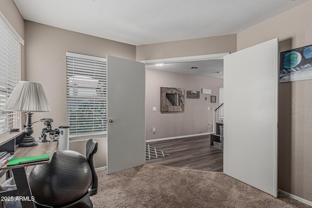 view of carpeted office space