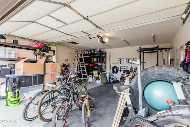 garage featuring a garage door opener