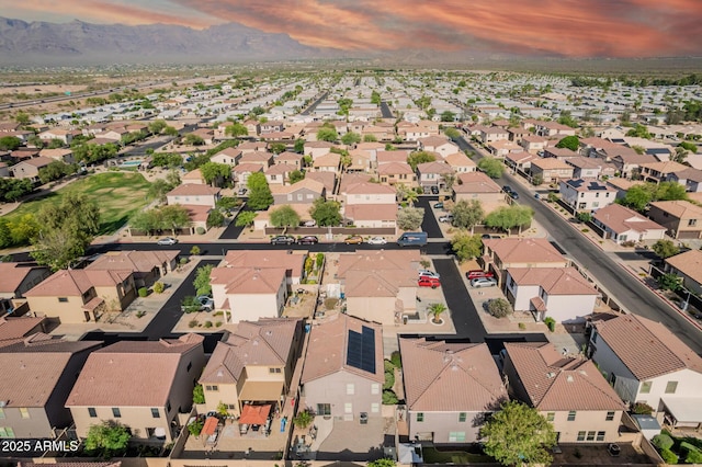 aerial view at dusk of a mountain view and a residential view