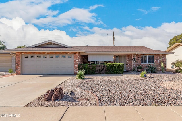 ranch-style house featuring a garage