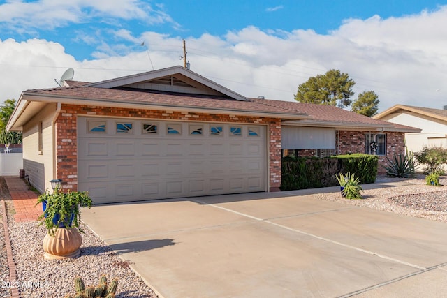 single story home featuring a garage