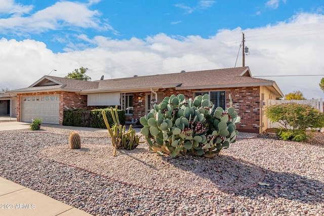 single story home featuring a garage