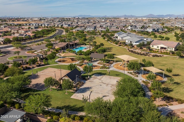 birds eye view of property with a residential view