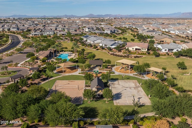 birds eye view of property featuring a mountain view and a residential view