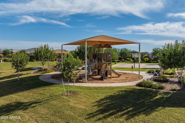 community playground featuring a yard