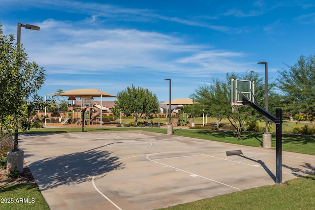 view of basketball court with playground community and community basketball court