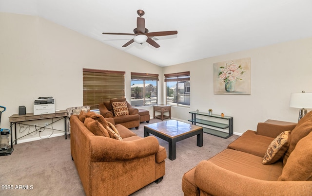 living room with carpet flooring, ceiling fan, vaulted ceiling, and baseboards
